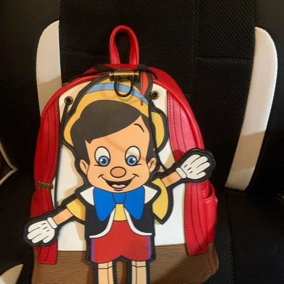 Pinocchio loungefly backpack with moving arms and matching loungefly wallet - Picture 4 of 16